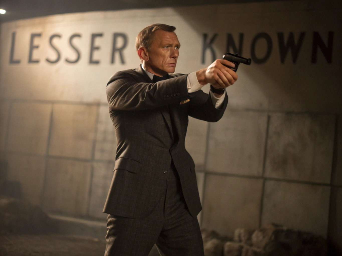 James Bond shooting with Lesser Known written in background

